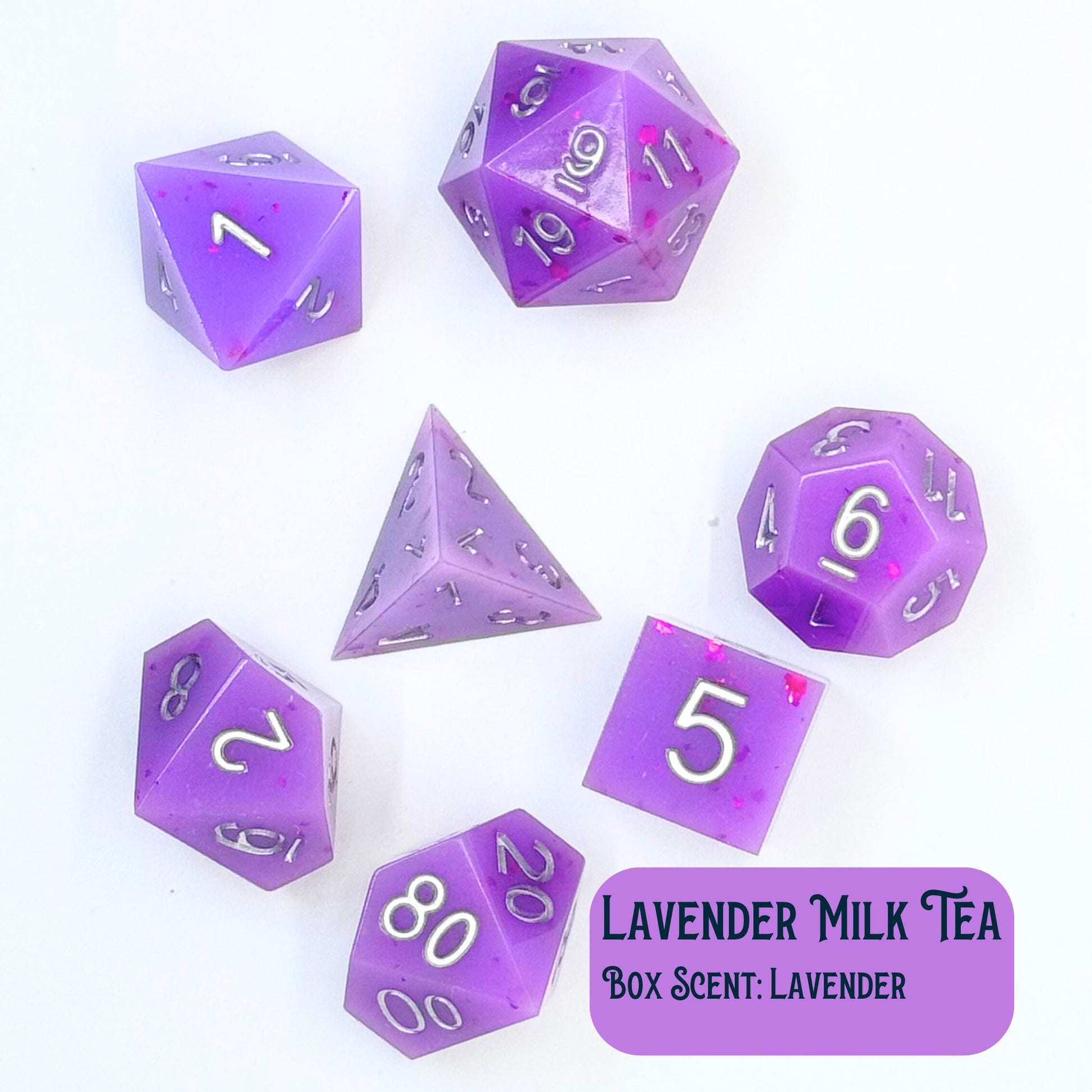 Lavender Milk Tea is a themed collection of seven polyhedral dice with a purple tint and silver painted numbers. Shown on a white background